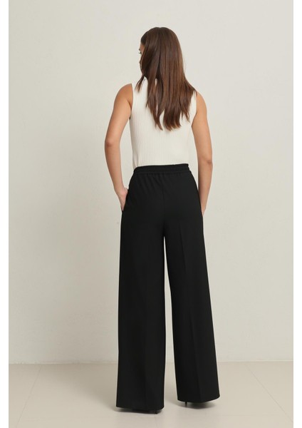 Siyah Belden Lastikli Rahat Kesim Geniş Paça Pantolon indirimleri