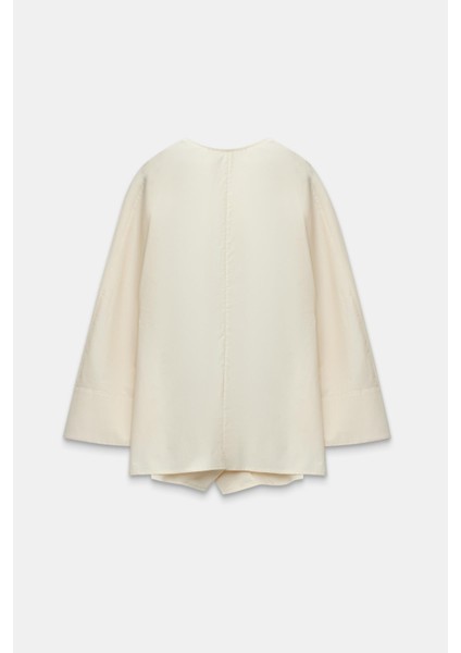 Krem V Yaka Büzgü Detaylı Pamuklu Gömlek fırsatları