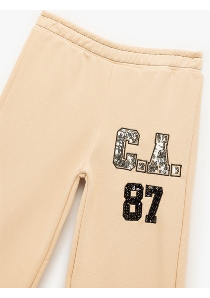 Şardonlu Pullu Payetli Pamuklu Beli Lastikli Geniş Paça Eşofman Altı modelleri