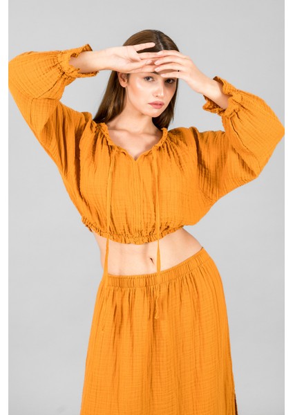 Müslin Kadın Reglan Kol Crop indirimleri