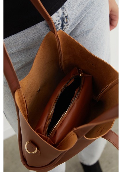 Suni Deri Fermuarlı Yavrulu Kol Çantası indirimleri