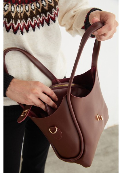 Suni Deri Fermuarlı Yavrulu Kol Çantası fırsatları