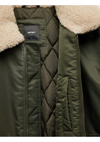 Uzun Kollu Cepli Etiket Detaylı Peluş Yaka Mont