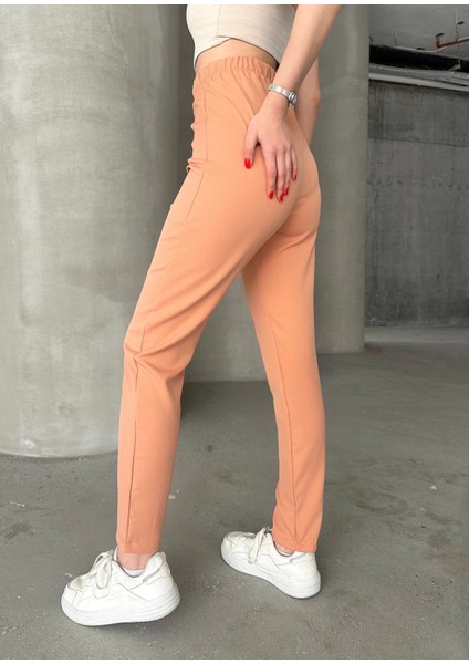 Beli Lastikli Karamel Pantolon Somon fırsatları