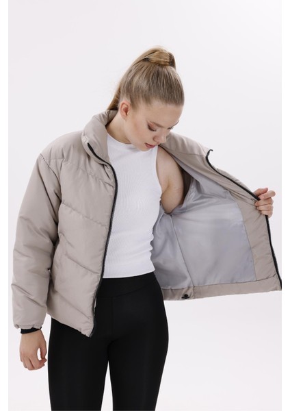 Kadın Dolgulu Puffer Mont - Yüksek Yaka, Suya Dayanıklı fırsatları