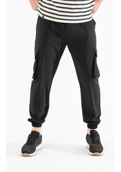 Erkek Siyah Likralı Esnek Ince Kumaş Lastikli Paça Torba Cep Pantolon