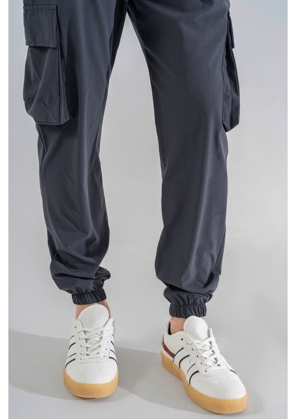 Erkek Gri Likralı Esnek Ince Kumaş Lastikli Paça Torba Cep Pantolon