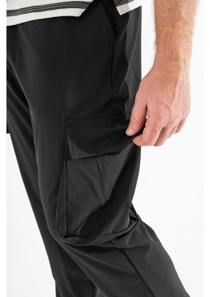 Erkek Siyah Likralı Esnek Ince Kumaş Lastikli Paça Torba Cep Pantolon