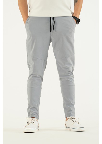 Erkek Açık Gri Nefes Alan Likralı Esnek Kumaş Dar ve Bilek Paça Jogger Pantolon fiyatları