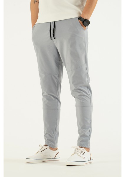 Erkek Açık Gri Nefes Alan Likralı Esnek Kumaş Dar ve Bilek Paça Jogger Pantolon modelleri