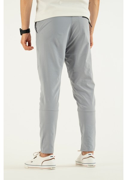 Erkek Açık Gri Nefes Alan Likralı Esnek Kumaş Dar ve Bilek Paça Jogger Pantolon fırsatları