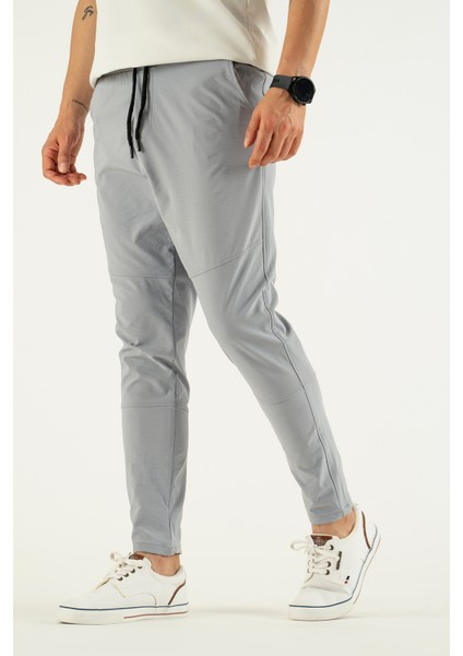 Erkek Açık Gri Nefes Alan Likralı Esnek Kumaş Dar ve Bilek Paça Jogger Pantolon
