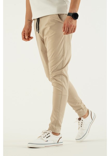 Erkek Taş Rengi Nefes Alan Likralı Esnek Kumaş Dar ve Bilek Paça Jogger Pantolon indirimleri