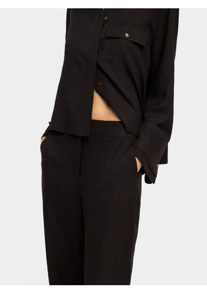 Buruşuk Görünümlü Dökümlü Pantolon indirimleri