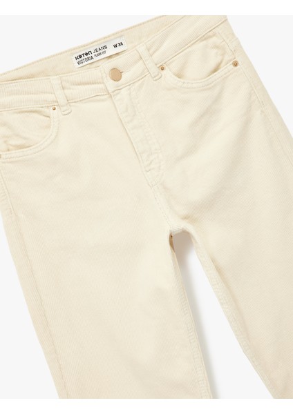 Dar Kesim Düğmeli Cepli Ispanyol Paça Jean Pantolon - Flare Jeans modelleri