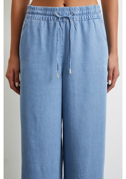 Beli Lastikli Bağcıklı Geniş Paça Pantolon Mavi indirimleri