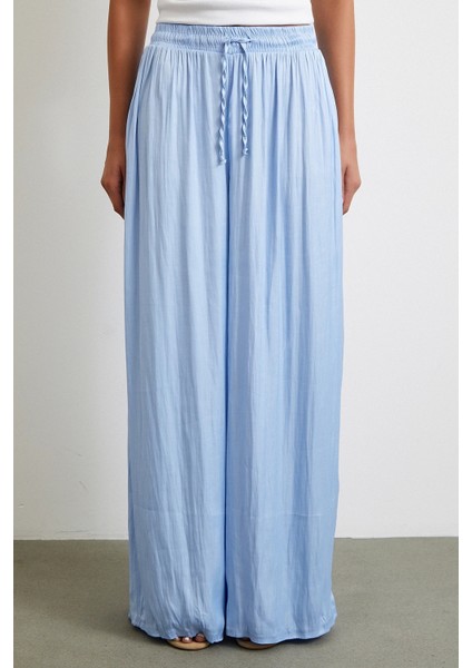 Beli Lastikli Geniş Paça Büzgülü Pantolon Mavi fırsatları