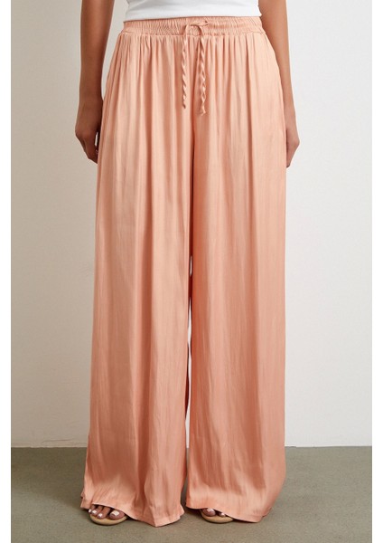Beli Lastikli Geniş Paça Büzgülü Pantolon Pudra fırsatları