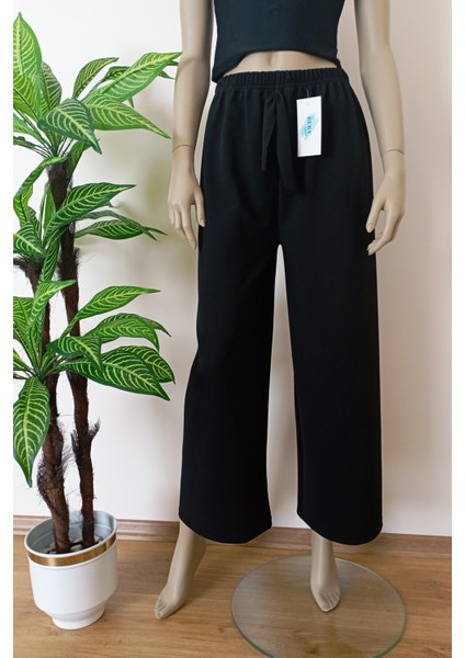 Kadın Siyah Dökümlü Krep Kumaş Beli Lastikli Bol Paça Pantolon modelleri