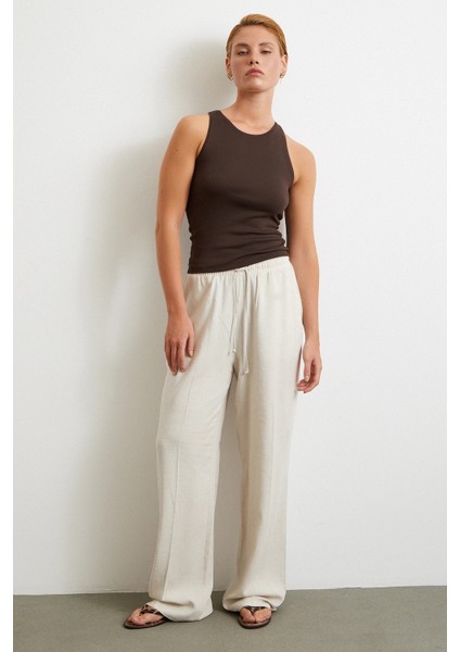 Beli Lastikli Boru Paça Pantolon Bej