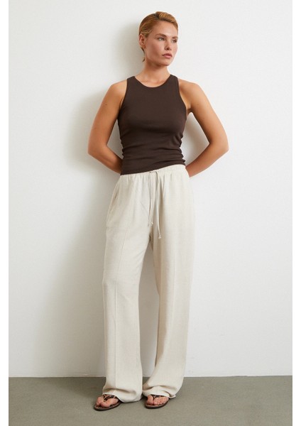 Beli Lastikli Boru Paça Pantolon Bej modelleri