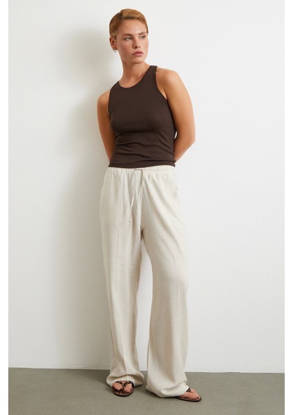 Beli Lastikli Boru Paça Pantolon Bej fırsatları