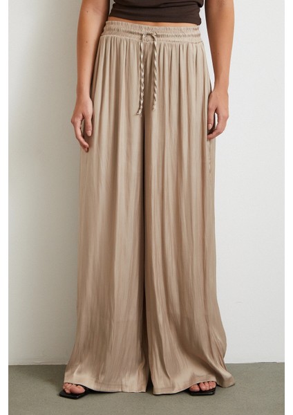 Beli Lastikli Geniş Paça Büzgülü Pantolon Bej indirimleri