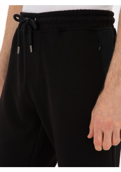 Erkek Siyah Slim Fit Pamuk Karışımlı Paçası Lastikli Eşofman Altı 50309819-VR046