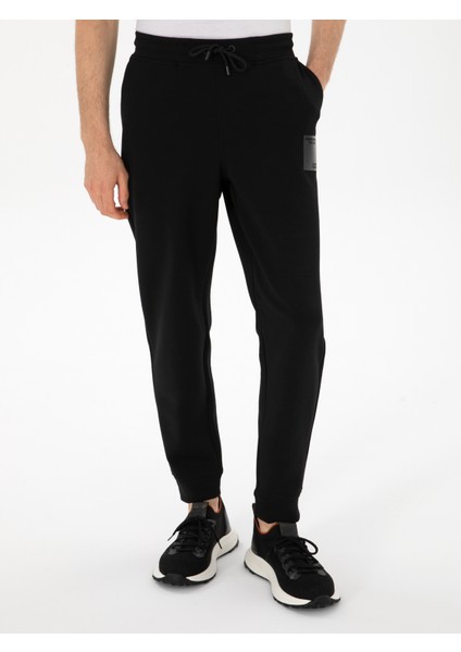 Erkek Siyah Slim Fit Pamuk Karışımlı Paçası Lastikli Eşofman Altı 50311677-VR046 fiyatları