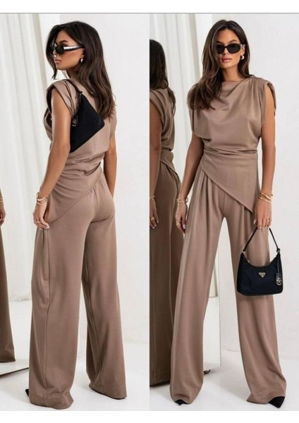 Kadın Dalgıç Kumaş Sıfır Kol Bluz ve Bol Kesim Pantolon Ikili Takım fırsatları