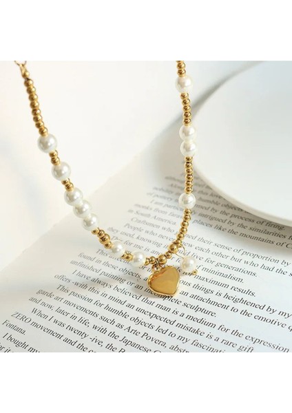Şıklığınızı Tamamlayacak Inci Boncuk Kalp Kolye modelleri