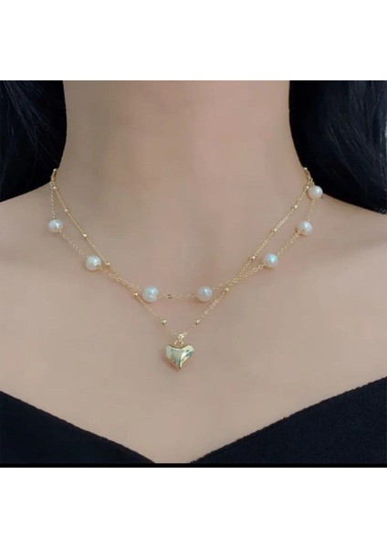 Şıklığınızın Tamamlayıcısı: Incili Zincir Kalp Kolye