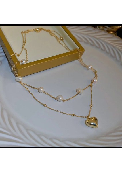 Şıklığınızın Tamamlayıcısı: Incili Zincir Kalp Kolye fiyatları