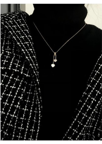 Aşkın Sembolü: Iki Kalpli Kolye