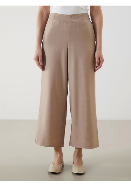 Lcw Modest Bej Beli Lastikli Geniş Paça Kadın Pantolon fiyatları