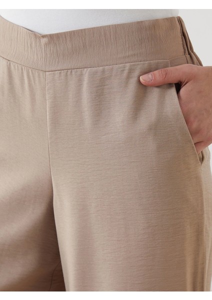 Lcw Modest Bej Beli Lastikli Geniş Paça Kadın Pantolon modelleri