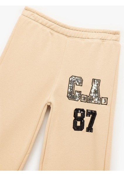 Kız Çocuk Şardonlu Pullu Payetli Pamuklu Beli Lastikli Geniş Paça Eşofman Altı (Aw 25) modelleri