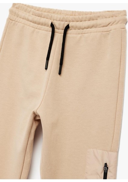 Erkek Çocuk Üç Iplik Şardonlu Baskılı Fermuar Cepli Beli Bağcıklı Jogger Eşofman Altı (Aw 25) modelleri