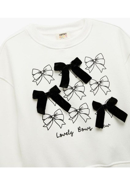 Kız Çocuk Fiyonk Detaylı Uzun Kollu Bisiklet Yaka Şardonlu Baskılı Sweatshirt (Aw 25) modelleri