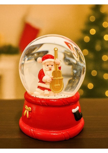 Yeni Yılın En Güzel Hediyesi 2026 Yılbaşı Çello Çalan Noel Baba Temalı LED Işıklı 9 cm Kar Küresi