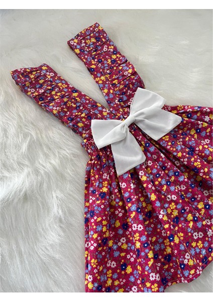 Kız Çocuk Bordo Çiçekli Fiyonklu Fırfır Askılı Salopet Elbise (%100 Pamuk Kumaştan Üretilmiştir.) modelleri