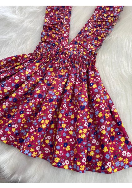 Kız Çocuk Bordo Çiçekli Fiyonklu Fırfır Askılı Salopet Elbise (%100 Pamuk Kumaştan Üretilmiştir.)