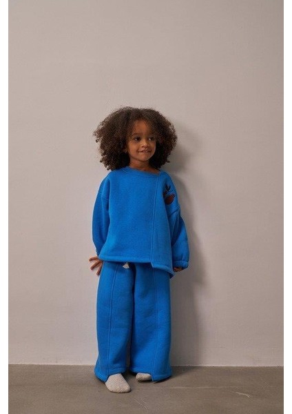 Mavi Omuz Nakışlı Asimetrik Detaylı Alt Üst Takım