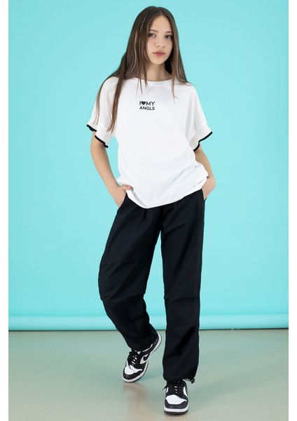 Siyah Yazılı Oversize Tişörtlü Paraşüt Pantolonlu Kız Çocuk Takım 20293 modelleri