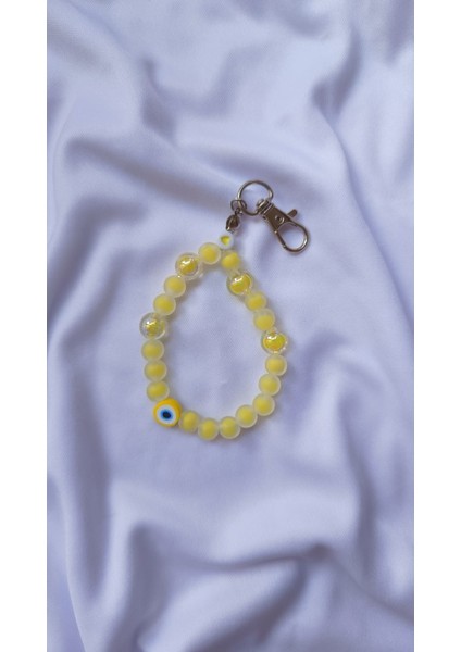 Sarı Nazar Boncuklu Charm – Zarafetin ve Korumanın Buluşması fiyatları