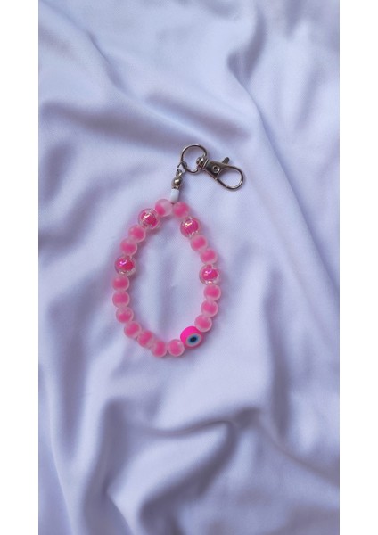 Pembe Nazar Boncuklu Charm – Zarafetin ve Korumanın Buluşması fiyatları