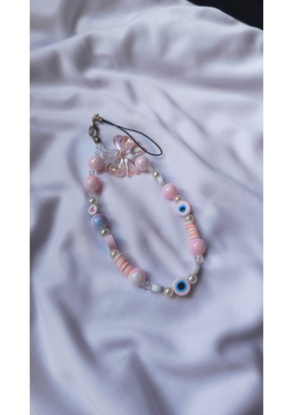 Pembe Nazar Boncuklu Şans Charmı – El Yapımı Telefon Askısı & Çanta Charmı fiyatları