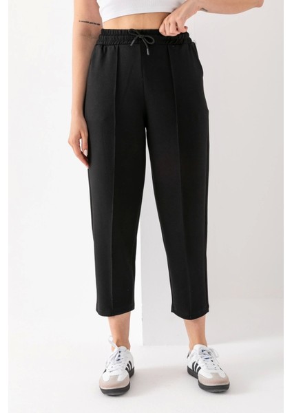 Kadın Siyah Beli Lastikli Modal Kumaş Çımalı Bilek Pantolon Yumuşak Dokulu Şık Bağcıklı Pantolon modelleri