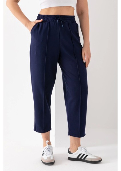 Kadın Lacivert Beli Lastikli Modal Kumaş Çımalı Bilek Pantolon Yumuşak Dokulu Şık Bağcıklı Pantolon modelleri