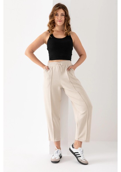 Kadın Bej Renk Beli Lastikli Modal Kumaş Çımalı Bilek Pantolon Yumuşak Dokulu Şık Bağcıklı Pantolon